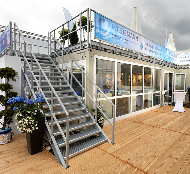 ELA Container - Messestand mit Terasse