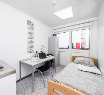 Wohncontainer mit Küche und Bett