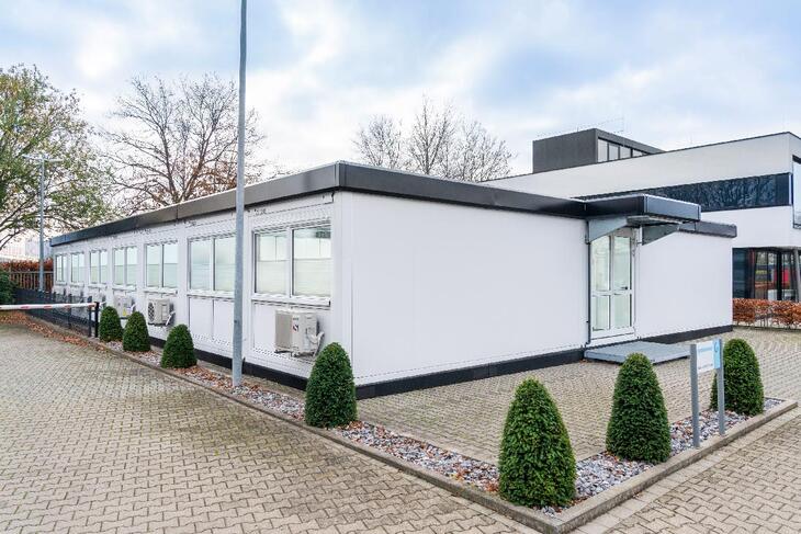 Kontorarealer i samme stil og farve som den oprindelige bygning