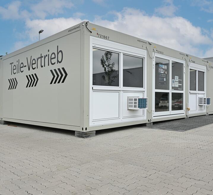 Car dealership from ELA containers