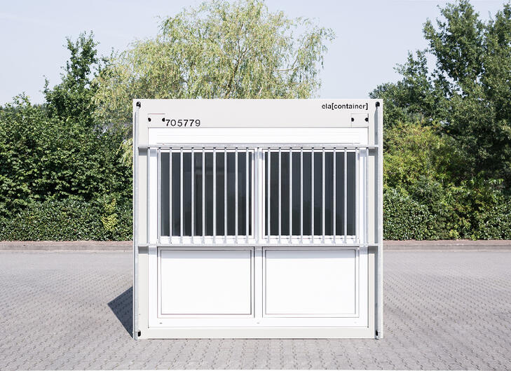 Container med gallerfönster