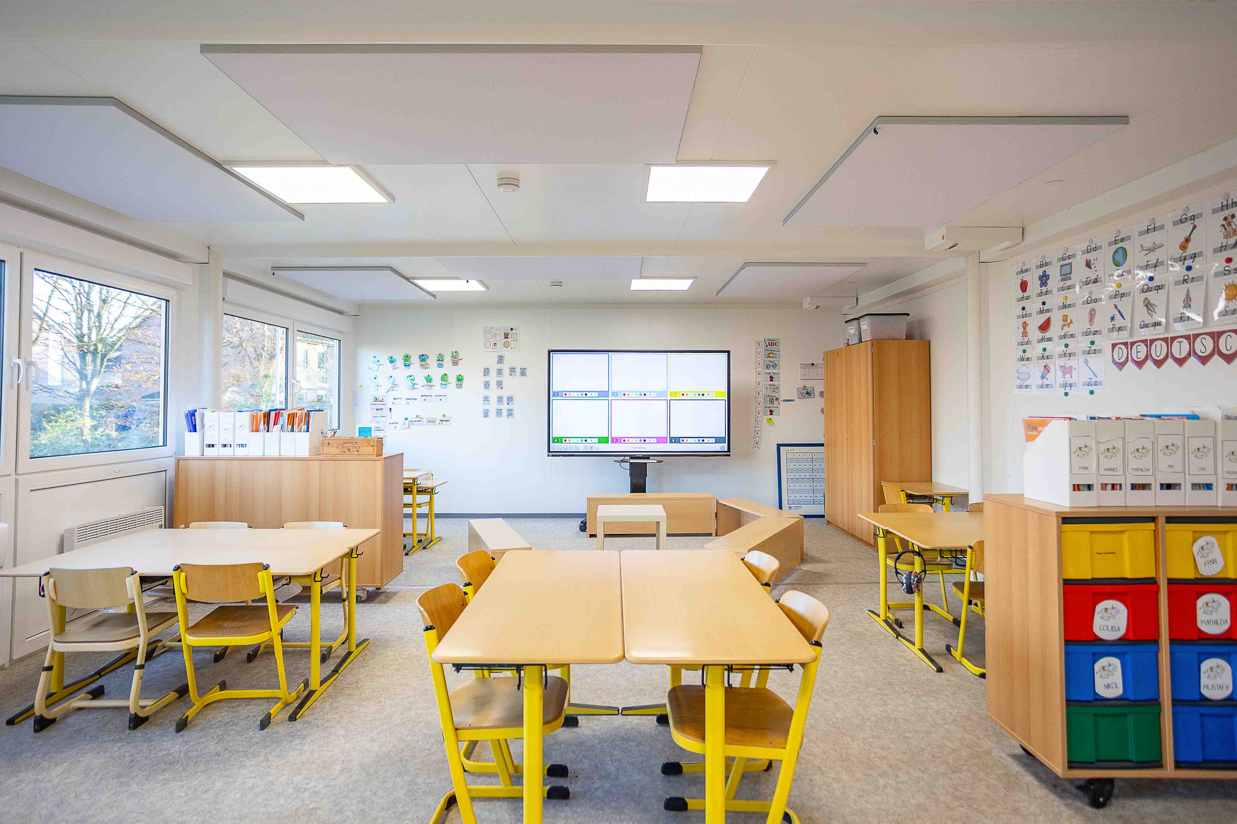 A bright, friendly classroom in the ELA school container serving as a temporary solution.