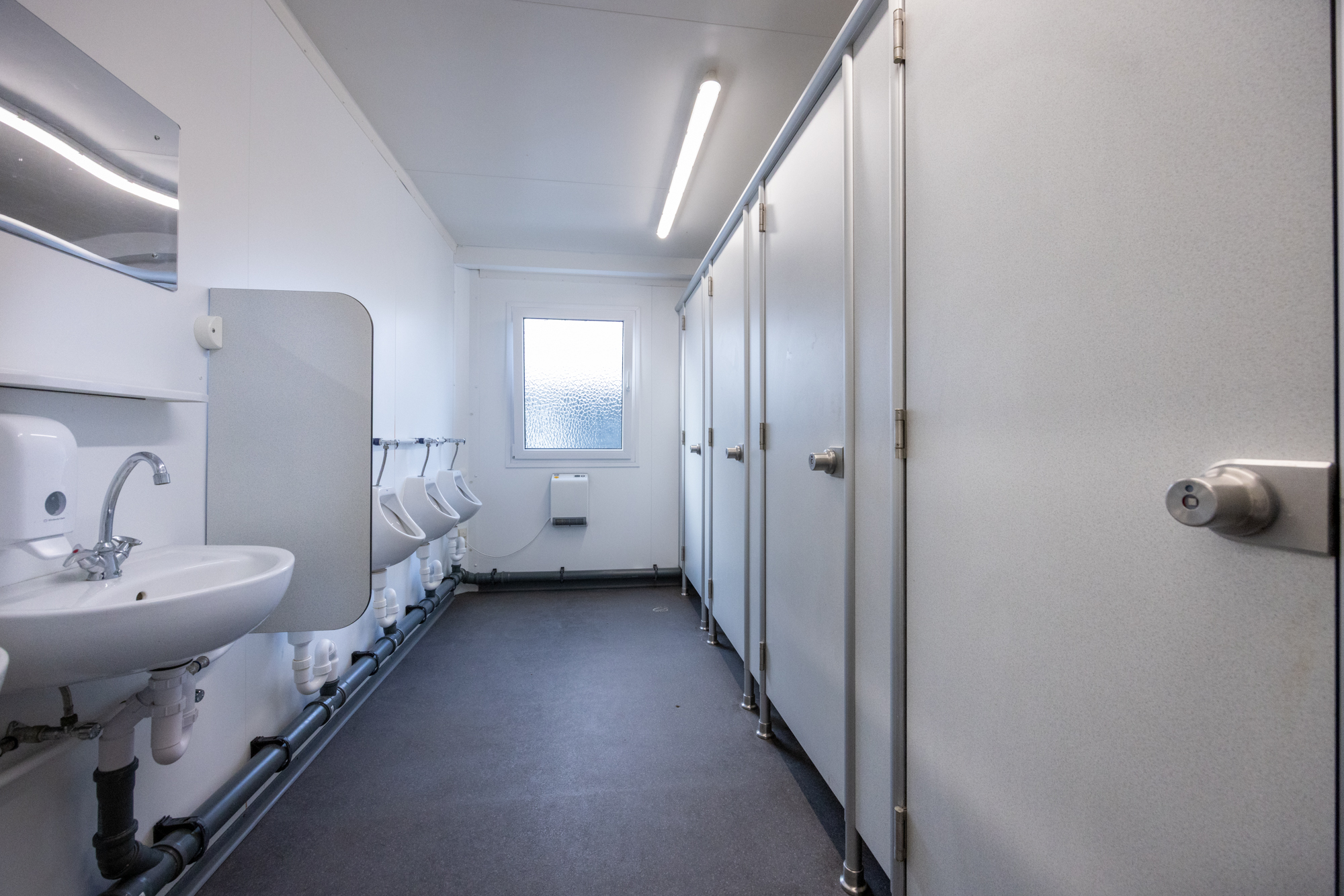 Toilet facilities complement the changing rooms.