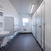 Dedicated toilet facilities complement the changing rooms, providing employees with the essential welfare facilities they need.