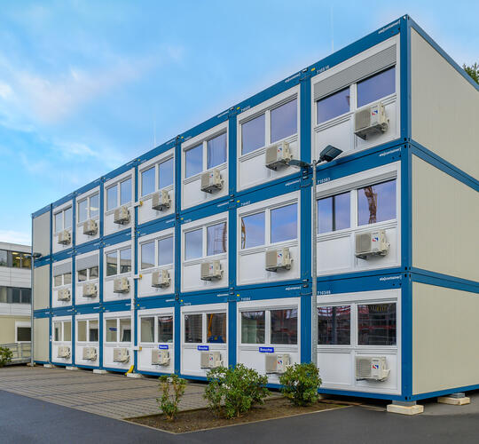 Building specialist relies on containers