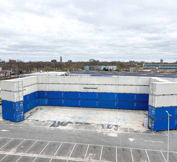 52 storage containers form a four-storey noise barrier
