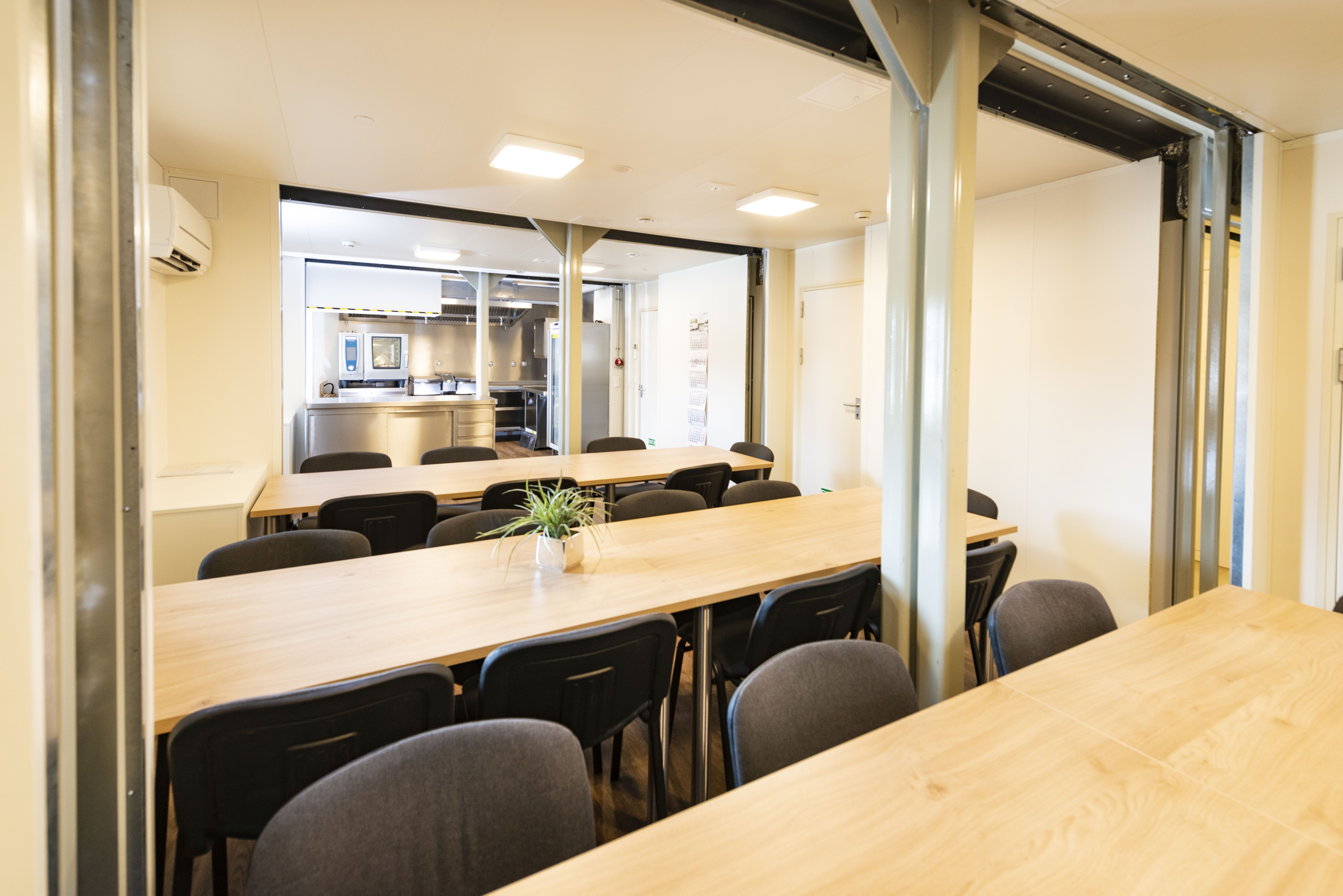 Container equipped with kitchen and dining area Container equipped with kitchen and dining area