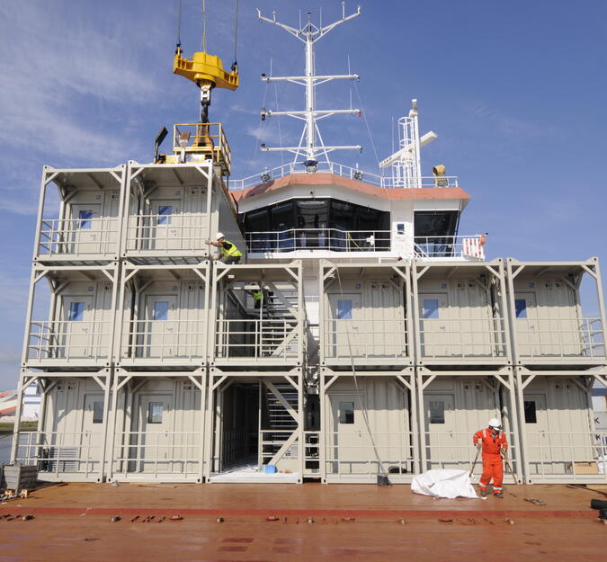 Accommodation Containers during installation on a vessel